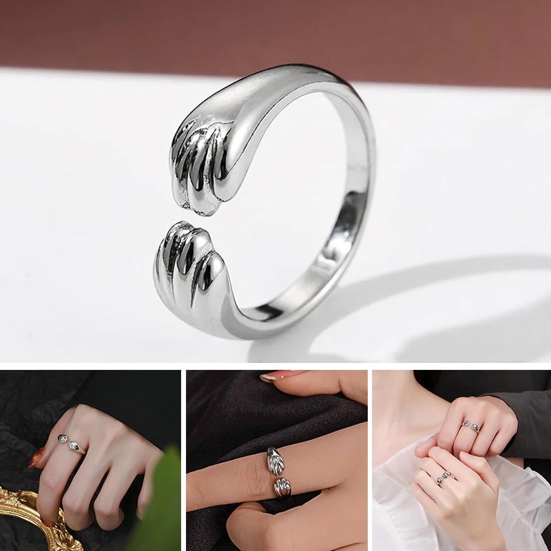 Åpen ring med kattens poter design og rundt spor