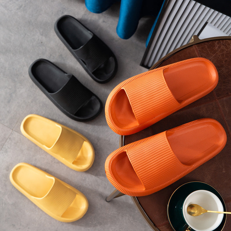 Sklisikker unisex tøfler med tykk bunn