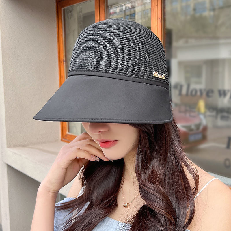 Solkremhatt for kvinner med stor brem for strandtur om sommeren