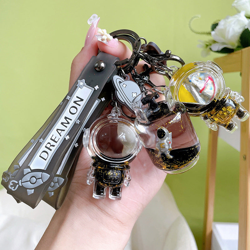 Flytende astronaut nøkkelring