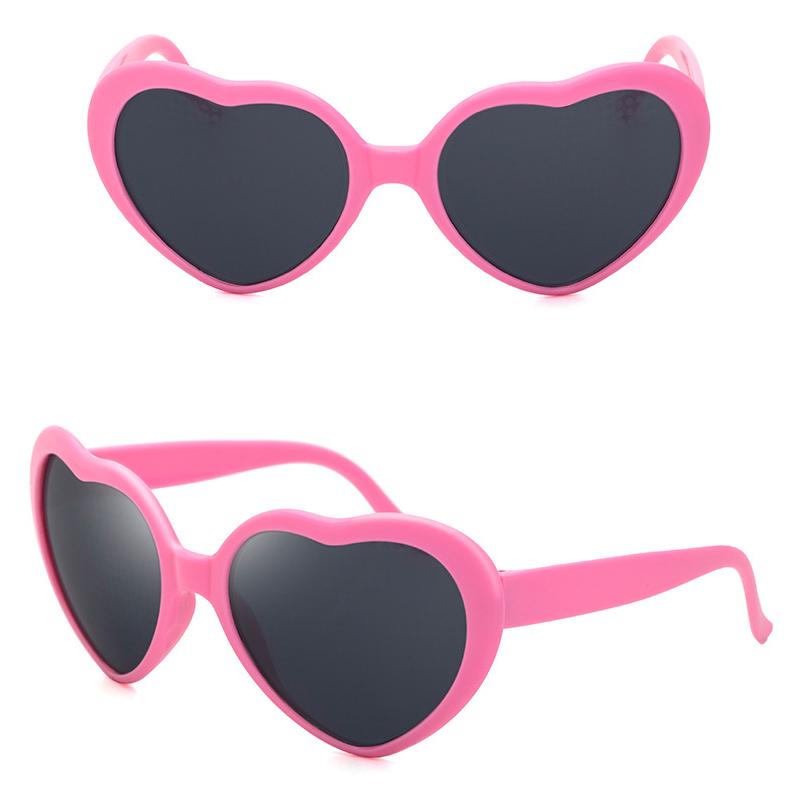 Store overdimensjonerte hjerteformede solbriller for kvinner