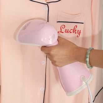 Håndholdt dampstrykemaskin