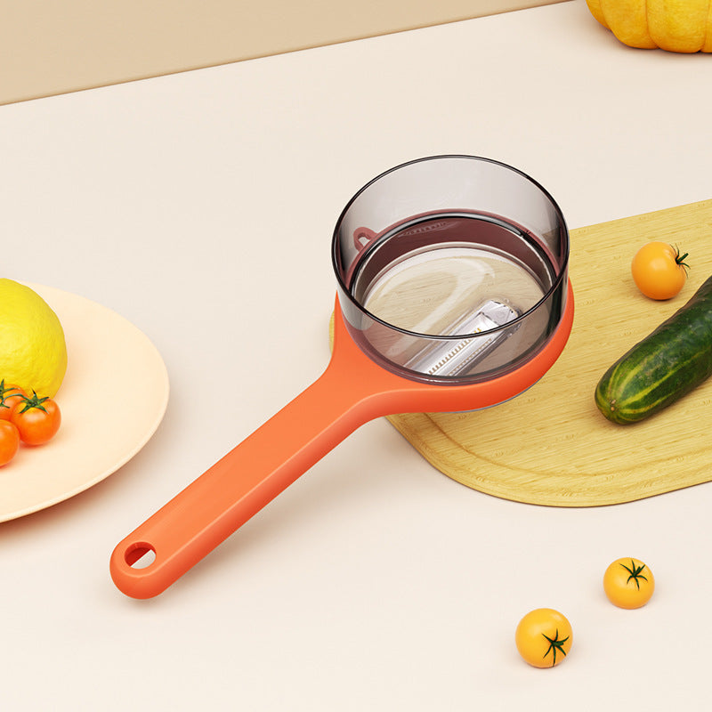 Vegetableskreller med oppbevaringsboks