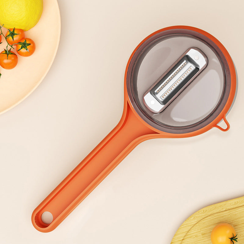 Vegetableskreller med oppbevaringsboks
