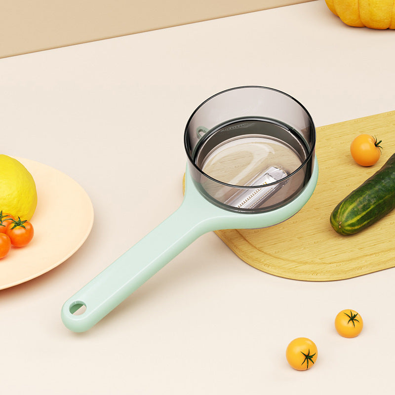 Vegetableskreller med oppbevaringsboks