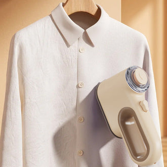 Bærbar håndholdt dampjern