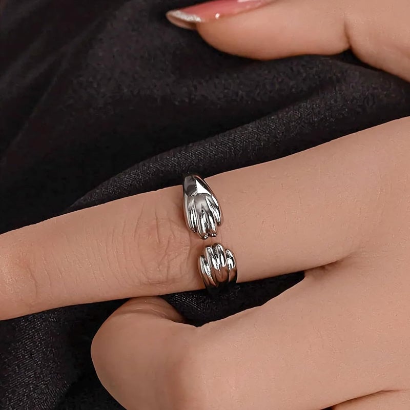 Åpen ring med kattens poter design og rundt spor