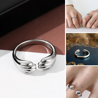 Åpen ring med kattens poter design og rundt spor