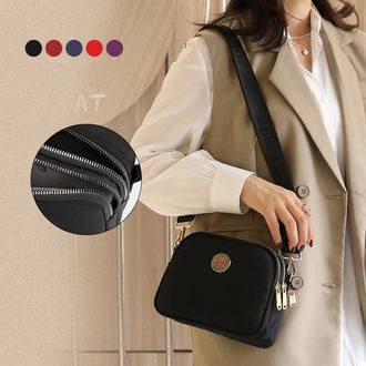 Skulderveske i nylon med enkelt stropp