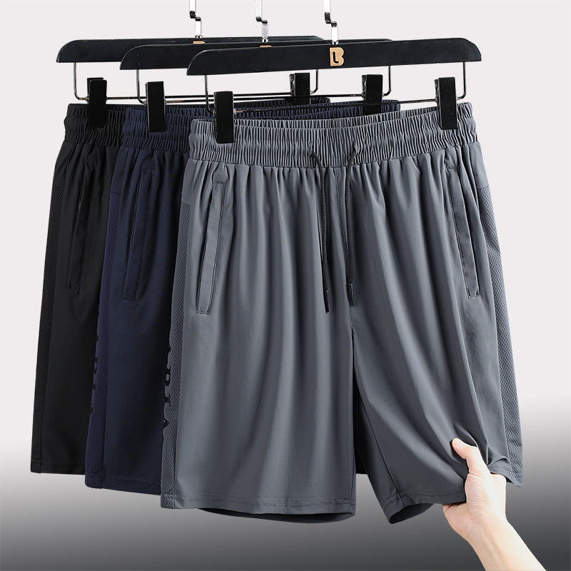 Sommerelastiske sportsshorts for menn