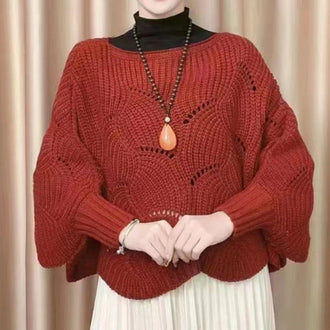 Flaggermusermet strikkesjal