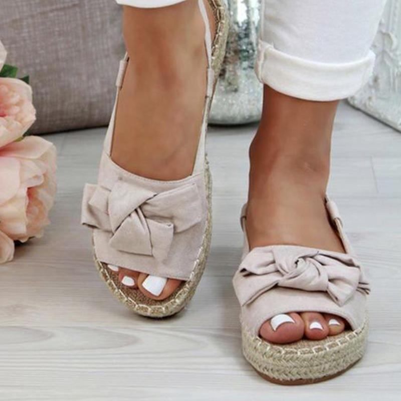 Kvinners flate sandaler med sløyfeknute