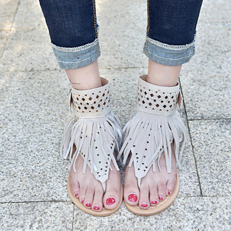 Bohemske perle-sandaler med sildebein-design