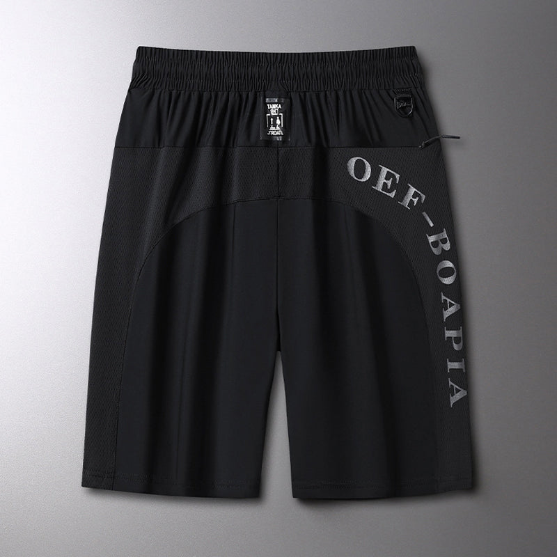 Sommerelastiske sportsshorts for menn