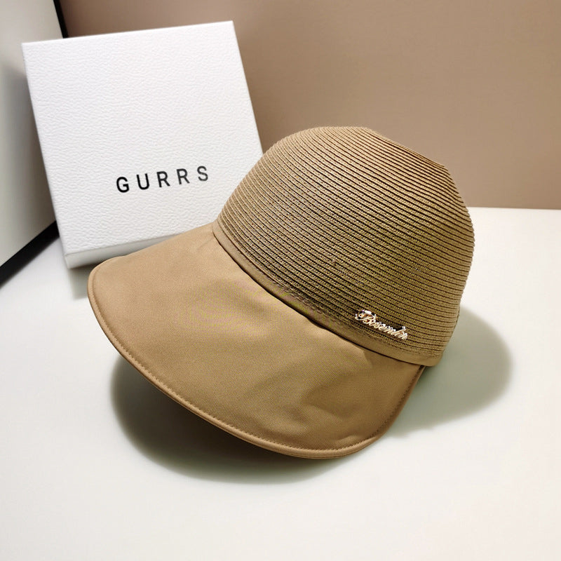 Solkremhatt for kvinner med stor brem for strandtur om sommeren