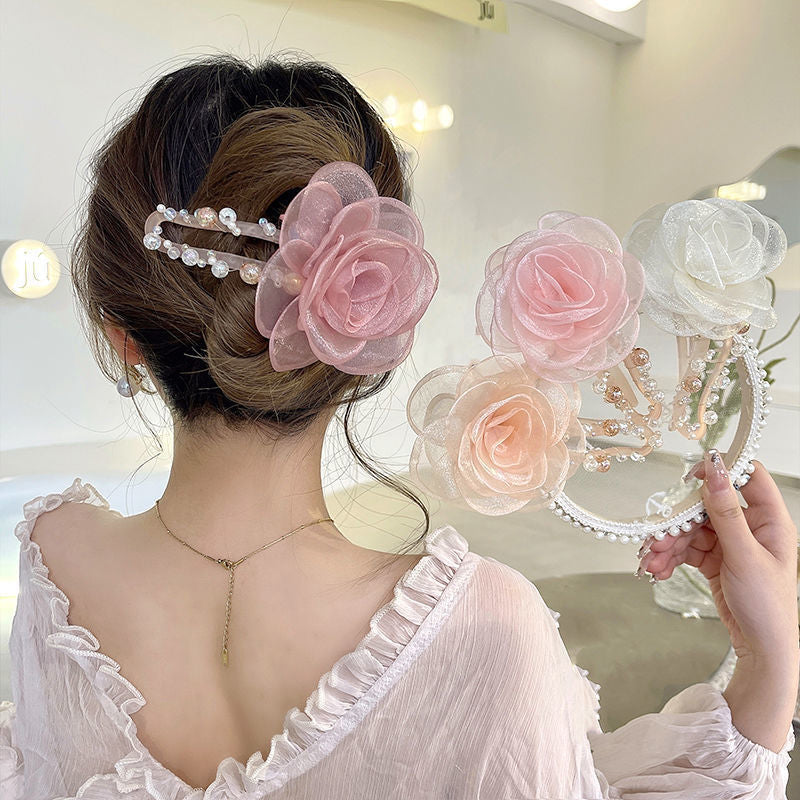 Elegant hårklips med blomster