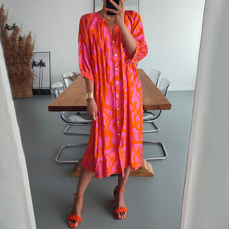 Løs kjole med V-hals