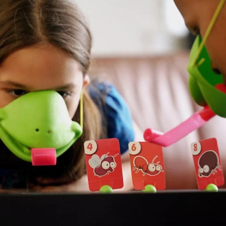Brettspill med kameleon som stikker ut tungen