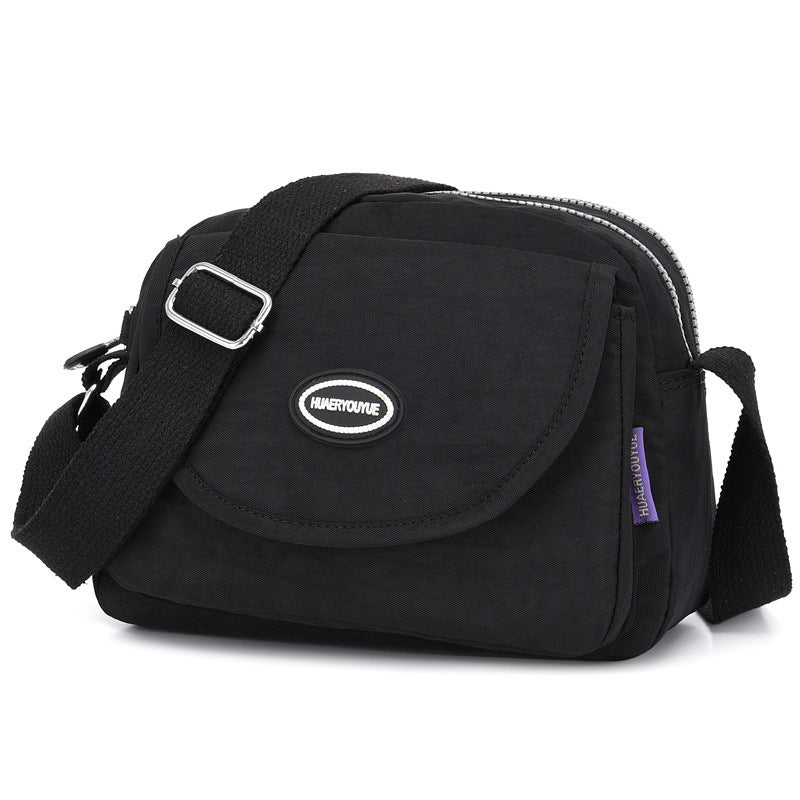 Vanntett nylon skulderveske for damer