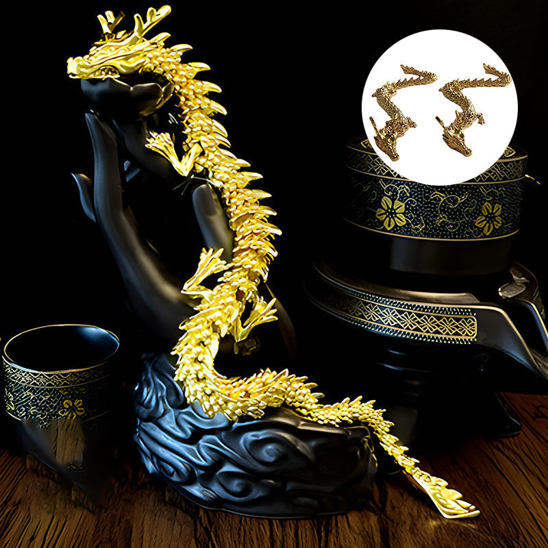 Gull-dragon med bevegelige ledd
