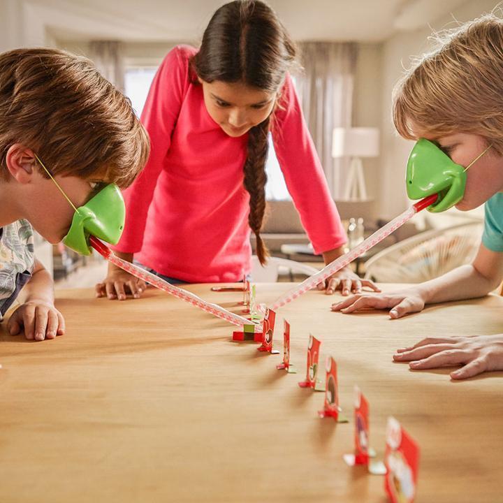 Brettspill med kameleon som stikker ut tungen